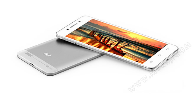 Two smartphones on a plain background, one showing a sunset-toned screen and one resting face-down in silver